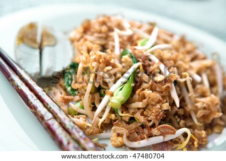 Delicious stir fried oriental noodles with baby bok choi and bean sprouts.