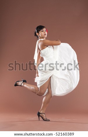 Beautiful flamenco dancer in white dress