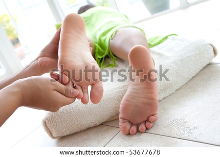 Woman having foot reflexology