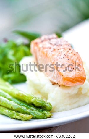 Baked salmon with mash potato and grilled asparagus
