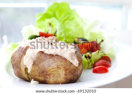 Baked jacket potato with tuna and fresh salad