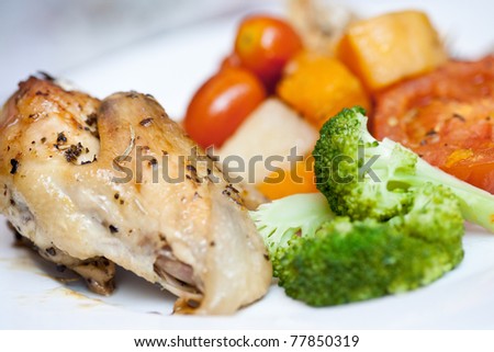 Delicious roast chicken with broccoli and roasted vegetables