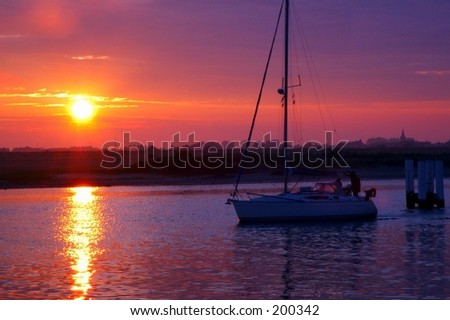 A sunrise in a yacht\
\
harbor in the city of Nieuwpoort, new port in belgium.