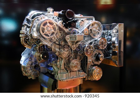 Close-up shot of an  automobile engine on display.