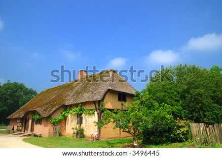 Rural belgium, historical preserved farm house with reed roof.  Vintage, culture concept.