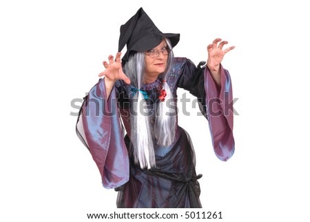Halloween witch with scary expression, raised clawing hands, holiday, fear concept