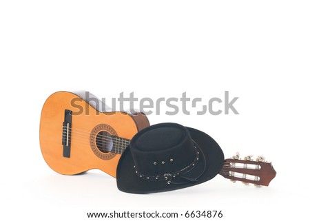 Country & Western guitar and cowboy hat. White background,