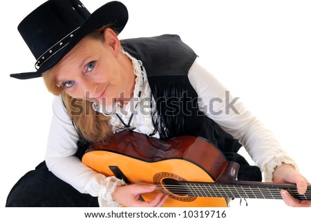 Middle aged country and western singer woman with traditional dress playing the  guitar. White background