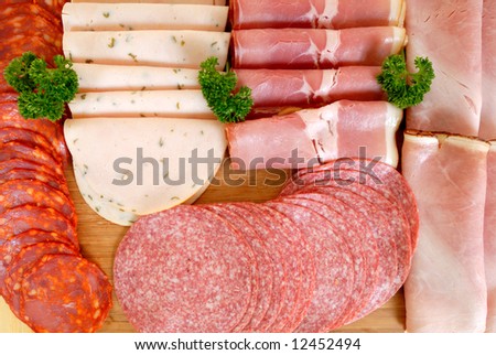 Breakfast, variety of bread meat on cutting board,   studio shot