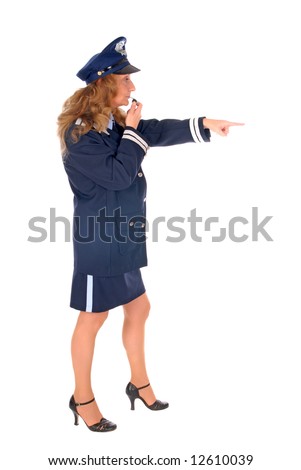 Attractive middle aged female police officer blowing the whistle. White background