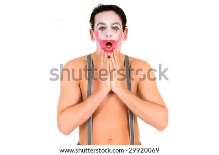 Sad Clown Makeup. stock photo : Sad male clown showing emotion of pain and sorrow, removing makeup.