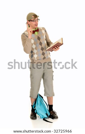 Young nerd with bow tie, shorts and cap, with backpack. Studio, white background