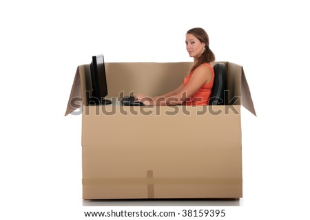 Young attractive woman having a chat session, chat box, cardboard box representing chat room.  Studio, white background
