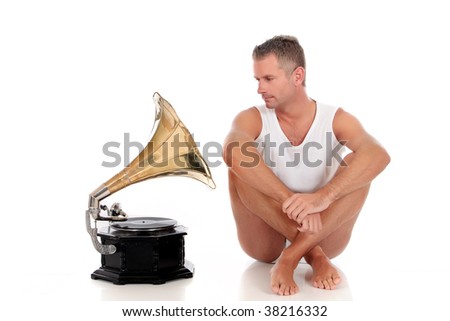 Antes fossem os meus audiófilos... Stock-photo-handsome-middle-aged-man-in-his-forties-with-antique-record-player-studio-white-background-38216332