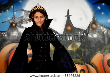 Young woman, Halloween princess with crown. Studio, white background.