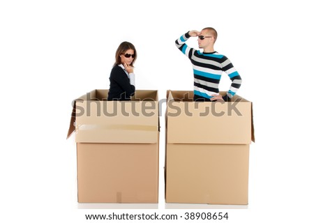Young couple having a blind date, chat box, cardboard box representing chat room.  Studio, white background