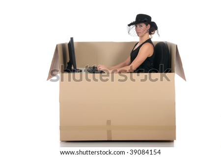 Young attractive woman having a chat session, chat box, cardboard box representing chat room.  Studio, white background