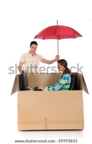 Young couple friends in chat box, safe supervised surfing, cardboard box representing chat room.  Studio, white background