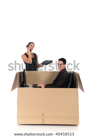 Young couple friends in chat box, cardboard box representing chat room.  Studio, white background
