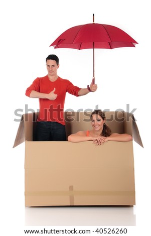 Young couple friends in chat box, safe supervised surfing, cardboard box representing chat room.  Studio, white background