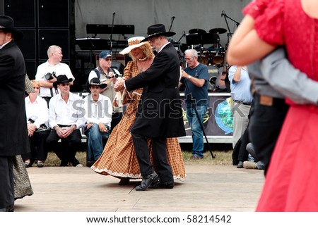 BREDENE , BELGIUM - JULY 31: Participants in the Country & Western sing/dance weekend wear traditional western outfits July 31, 2010 in Bredene , Belgium
