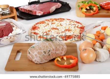 Diversity display of uncooked meals. Variety of prepared meat. Studio shot. White background