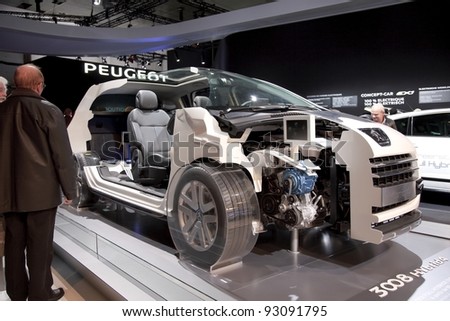 BRUSSELS, BELGIUM - JANUARY 12: Annual autosalon brussel 2012 auto motor show in Heysel  expo hall. Open Peugeot 3008 HYbrid4 concept car on display.  January 12, 2012 in Brussels,  Belgium