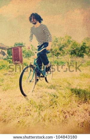 handsome man on bicycle, art image