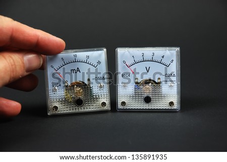 Stock pictures of traditional and analog electrical meters