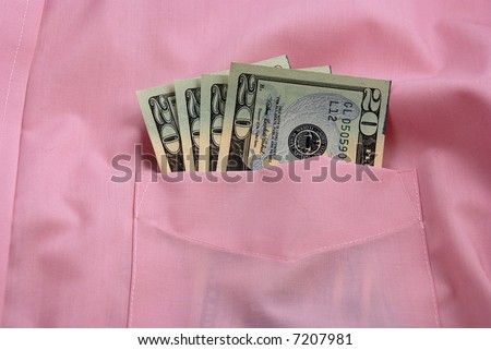 pictures of several twenty dollar bills in the pocket of a shirt