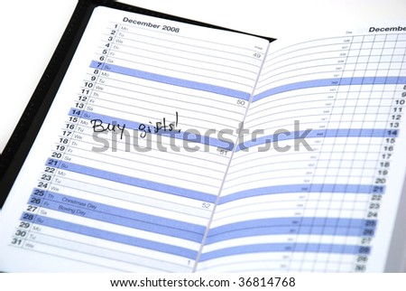 daily planner showing that is time to buy gifts