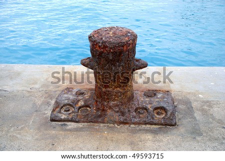 stock picture of ship ropes and structures to mooring the ship on the dock