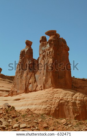 huge red rock cliff tower to climb
