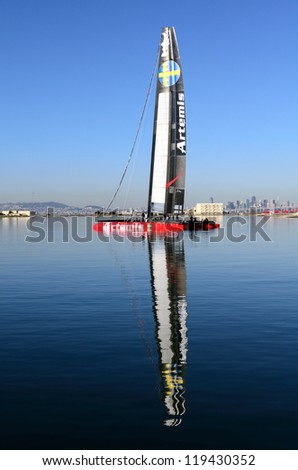 ALAMEDA, CA - NOVEMBER 2012: Artemis Racing sail boat crew working on the entry for the Worlds Cup in San Francisco.  Boat owned by  Royal Swedish Yacht Club, Alameda, California, November 12, 2012