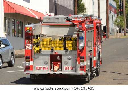 PORTLAND, OR - JULY 14: A fire engine responds to a medical emergency in the industrial areal of Portland Oregon on July 14th, 2013