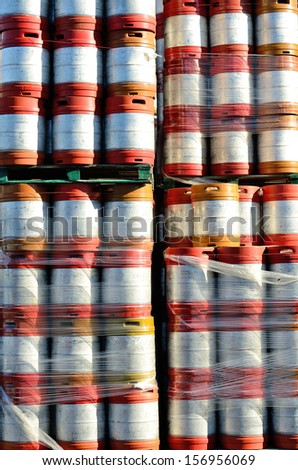 Large stack of colorful aluminum beer kegs outside one of the numerous microbrew beer breweries in Oregon.