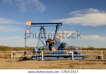 pumpjack, nodding donkey, horsehead, rocking horse, dinosaur, sucker rod, Big Texan, thirsty bird, or jack pump is the overground drive for a reciprocating piston pump in an oil well. in eastern Texas