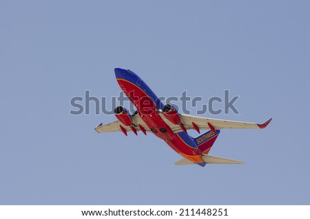 LAS VEGAS, NV, USA  - JUNE 24, 2014: A Southwest Airline Passenger Jet On Final Approach To Las Vegas International Airport on June 24, 2014. Southwest is the world\'s largest low cost carrier