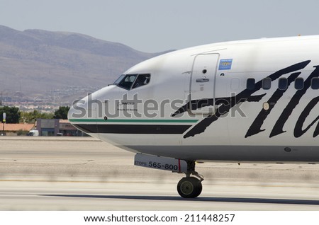 LAS VEGAS, NV, USA  - JUNE 24, 2014: A Alaska Airline Passenger Jet prepares for take-off at Las Vegas International Airport on June 24, 2014.