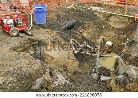 excavation contractor testing the domestic water system of a new commercial development before final connection the city system