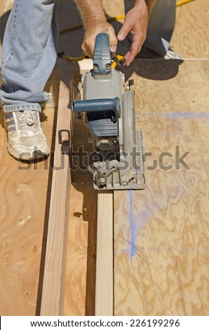 Framing Contractor cutting in a window or door opening in outside bearing wood stud wall