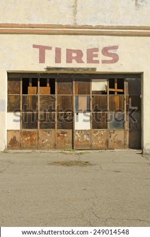 Old long closed up tire shop in a small town on an old highway in northern California