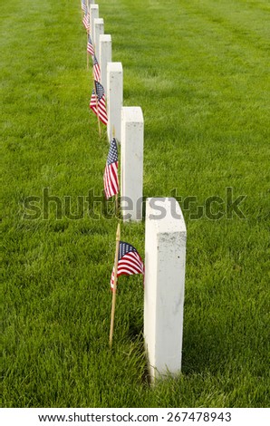 Flags placed at the final resting graves of USA military veterans during Memorial Day