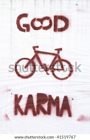 Bad Carma - Good Karma sign on a downtown natural food store in Eugene Oregon