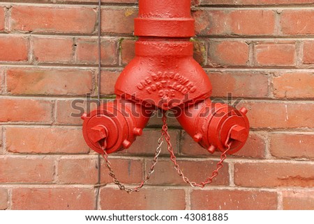This is a Oregon Brass Works Co fire department standpipe connection on the Pacific Building located at SE Cass and SE Rose Streets in downtown Roseburg OR