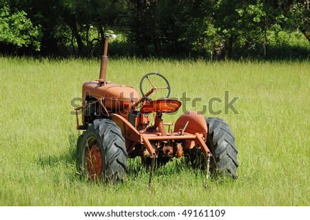 Old Tractor in a grass field near Wilbur OR, Just south of Roseburg