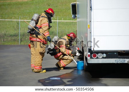 Oregon State Hazardous Material Team 1, Douglas County on a recent corrosive drill in Roseburg Oregon.  Team is made up by members of the Roseburg Fire Department.