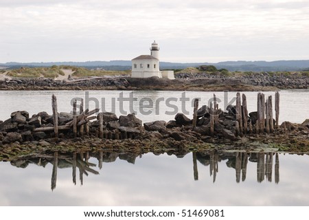 Coguille River Lighthouse and Pilings, Bandon Oregon, Low tide