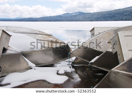 Aluminum fishing boats waiting for the spring thaw, Diamond Lake Resort area near Roseburg Oregon along the North Umpqua River.
