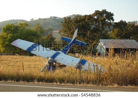 Airplane had a forced landing in a field, out of fuel, no injury, Roberts Creek Rd. Roseburg, OR